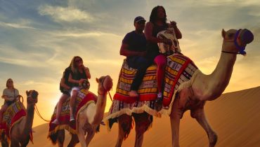 Premium Red Dunes Safari with Camel Ride & 3 Cuisines at Al Khayma Camp – Desert safaris